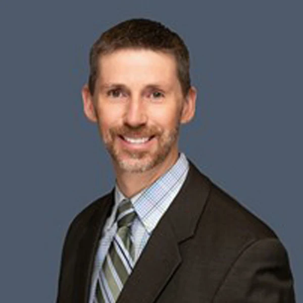 Portrait photo of Dr. Brian Cox